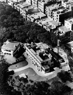 An aerial view of the 1883 Building in 1951 with the No. 1 quarter on the left, and the signal mast and the annex building on the right.