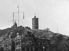 A photo in the exhibition: Tropical cyclone warning signals hoisting at Blackhead's Hill, Tsim Sha Tsui in the early 20th century