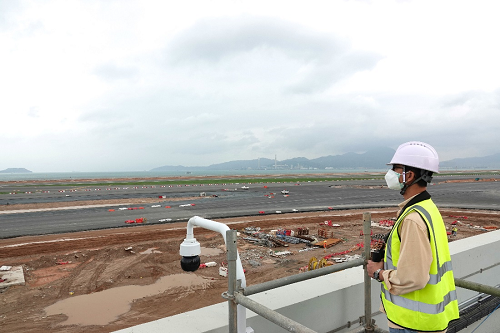 Weather observer making weather observations to support operation of the Third Runway