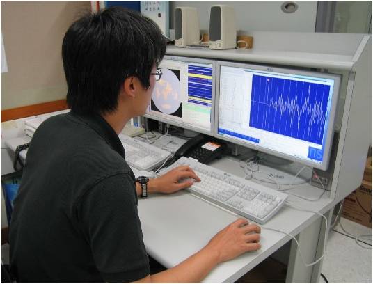 Observatory staff performing seismic analysis