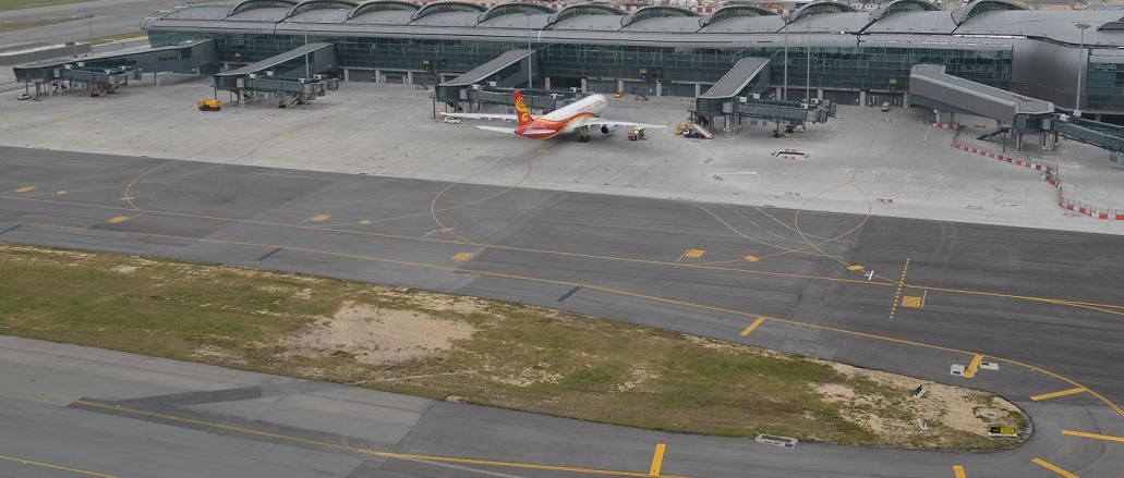 HX 658, the very first departure flight from the Midfield Concourse.