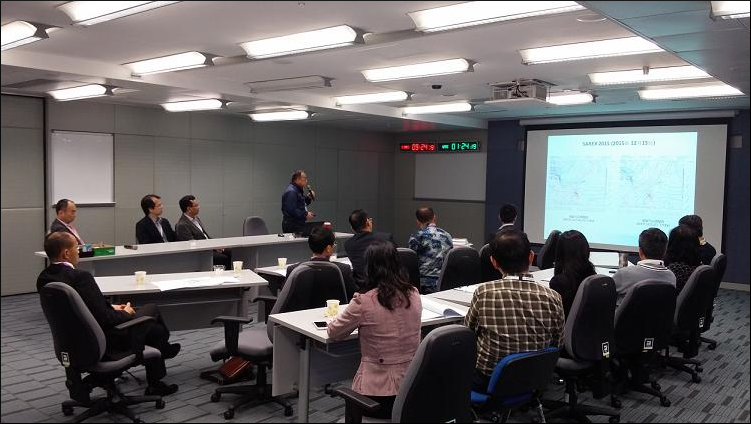 Mr. Paul Ho, Chief Experimental Officer of HKO delivering the weather briefing at the RCC.