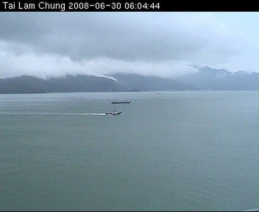 A weather photo overlooking northern Lantau.  On the day of photo taking, the cloud base was rather low with a height of around 300 metres.  The weather condition was very unstable, as manifested by the clouds streaming from the mountain gaps.