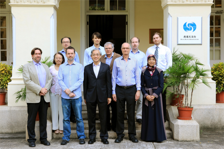 Mr. C.M. Shun, Director of the Hong Kong Observatory (front row, middle), taking a group photo with the experts
