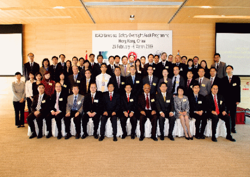 Mr. C.M Shun, Assistant Director of the Hong Kong Observatory (eighth from the right, second row), Mr. Norman Lo, Director General of Civil Aviation (sixth from the right, front row), Mr. Dhiraj Ramdoyal, Lead Auditor of the ICAO audit team (fifth from the right, front row) photographed with the team of CAD and HKO staff who participated in the audit.