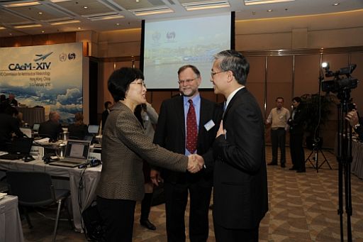 Deputy Administrator of China Meteorological Administration, Ms Jiao Meiyan (left), and Permanent Representative of New Zealand with WMO and former President of CAeM, Dr Neil Gordon (centre) congratulating Assistant Director of the Hong Kong Observatory (Aviation Weather Services), Mr C M Shun (right), on his election as the President of CAeM. 