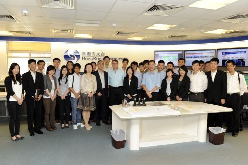 Participants and lecturers of the training course photographed with Captain Marcus De Santis (front row, eighth from left), Chief Pilot of Dragonair, and Mr. C.M. Shun (front row, seventh from left), Director of the Hong Kong Observatory at the Central Forecasting Office