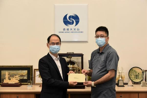 Mr Wu Man-yiu (right) was promoted to Senior Radar Specialist Mechanic