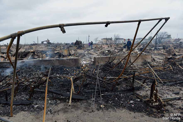 Damage is seen in the Breezy Point neighbourhood of Queens, New York