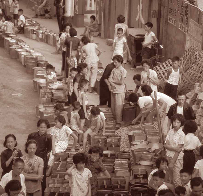 Citizens queuing for fresh water