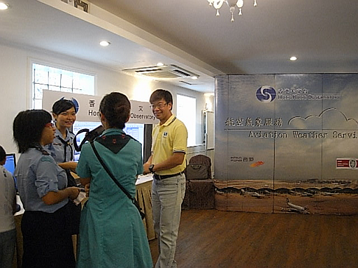 An aviation forecaster (right) explaining to the visitors on the types and mechanism of windshear