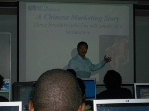 Mr LEUNG Wing-mo, Acting Assistant Director of the Observatory, giving lectures to African meteorologists