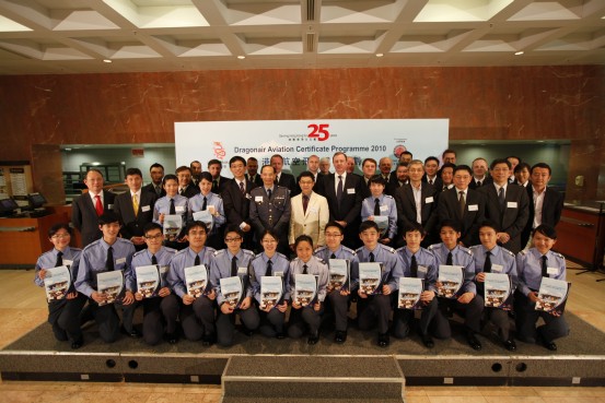 Assistant Director of the Hong Kong Observatory Mr. C.M. Shun (4th from right, 2nd row), Director-General of Civil Aviation Mr. Norman Lo (7th from left, 2nd row), Commanding Officer of the Hong Kong Air Cadet Corps Group Captain Jones Wong (6th from left, 2nd row) with cadets and representatives of the supporting organizations at the inaugural ceremony.