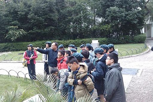 The air scouts were attentive while learning the operation of the weather observing equipment