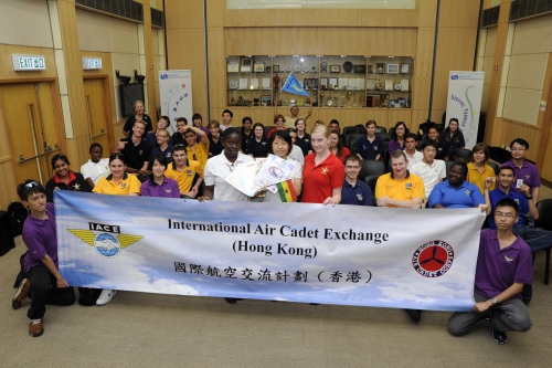 Miss Sharon Lau, Acting Assistant Director of the Hong Kong Observatory, received souvenirs from representatives of the delegates of the International Air Cadet Exchange Programme