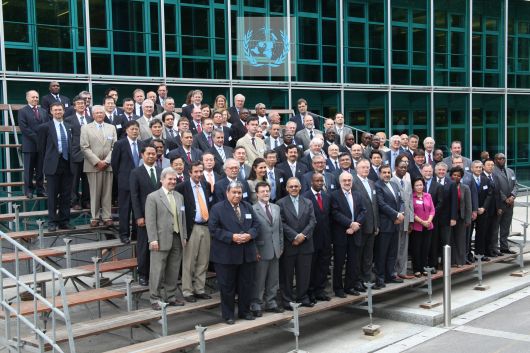 Shun Chi-ming (first row, third from the right) photographed with Michel Jarraud, Secretary General of WMO (first row, fifth from the left) and other participants attending the WMO Executive Council meeting at the WMO Headquarters.
