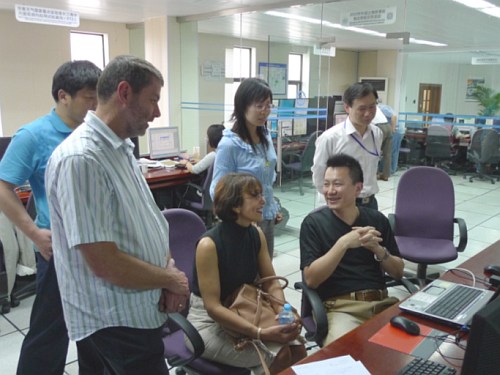 Mr Hon-yin Yeung (rightmost in the front row), scientific officer of the Observatory, introducing the SWIRLS forecast products provided by the Observatory for the Shanghai World EXPO to Ms Haleh Kootval, chief of the Public Weather Services Division of WMO (middle in the front row) at the Shanghai Meteorological Bureau.