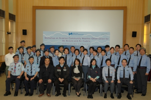 The participants of the Workshop on Aviation Community Weather Observation taking a group photo with the Assistant Director of the Hong Kong Observatory, Miss SY Lau (fourth right of the first row) and the instructors