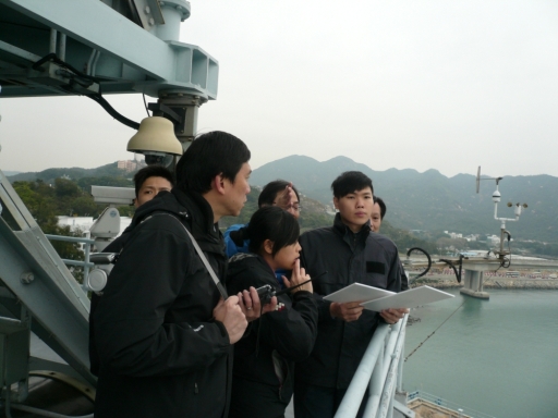 Participants going in groups to the platform of the antenna tower of the Terminal Doppler Weather Radar station at Tai Lam Chung to practise weather observation under the guidance of an experienced aviation weather observer of the Observatory