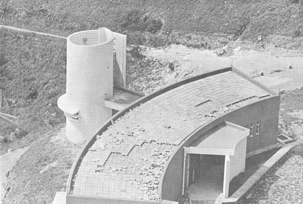 Tiles lifted off the windward side of the roof of the Police outpost near Tate's Cairn