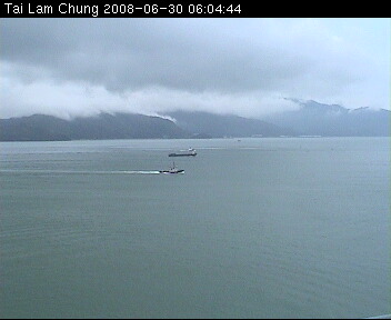 A weather photo overlooking northern Lantau. On the day of the photo was taken, the cloud base was rather low with a height of around 300 metres. The weather condition was very unstable, as manifested by the clouds streaming from the mountain gaps.