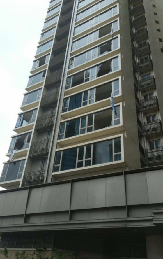 Window panes of residential buildings in Macao were broken. (Photo courtesy of Clarence Fong) 