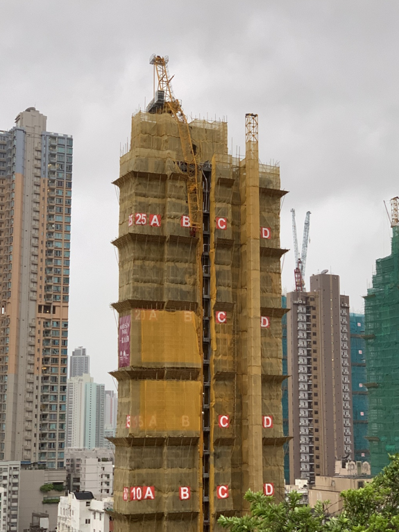 A tower crane in Sham Shui Po was blown down under high winds.