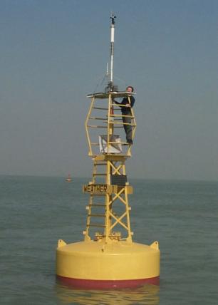 An Observatory personnel working on the weather buoy