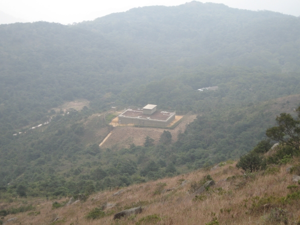 The new automatic raingauge station is located at the Ngong Ping Fresh Water Service Reservoir in the middle of the picture