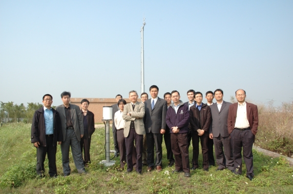 Meteorologists from Guangdong, Hong Kong and Macau pictured here in front of the automatic weather station at Wetland Park.