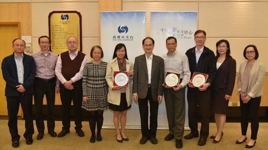 Principal Experimental Officer, Mr. Li Luen-on (fourth from right), Chief Experimental Assistant, Mr. Ng Yiu-wah (third from right), and Senior Personal Secretary, Ms Brenda Tong Lai-yee (fifth from left) retired