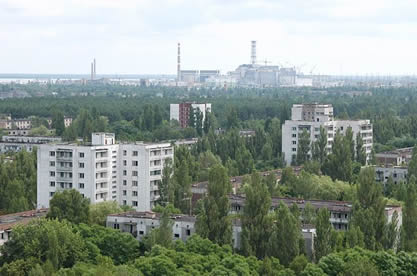 he Chernobyl nuclear power station at a distance, viewed from the deserted town
