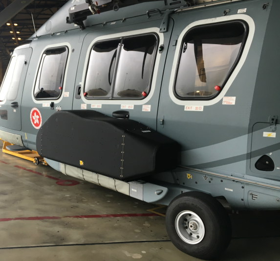 The ARMS detectors are installed inside a black pod attached to the exterior of the helicopter